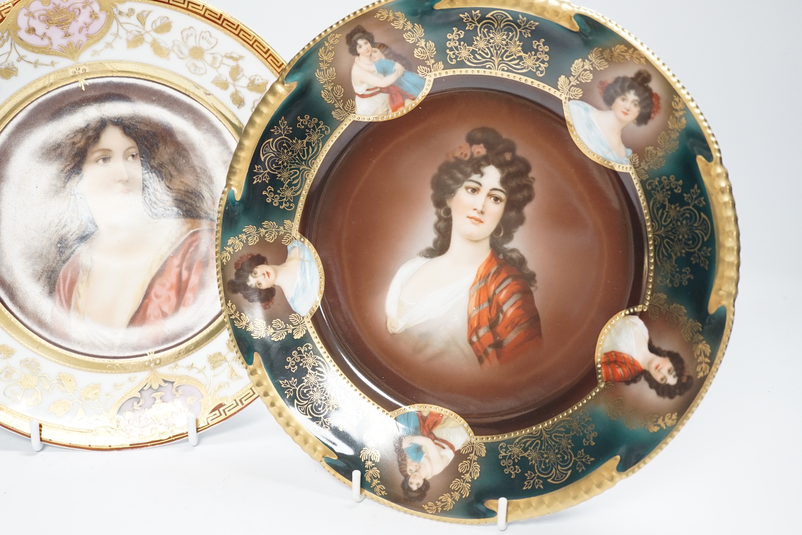 Two early 20th century Vienna style cabinet plates, printed and enamelled with portraits, 24cm diameter